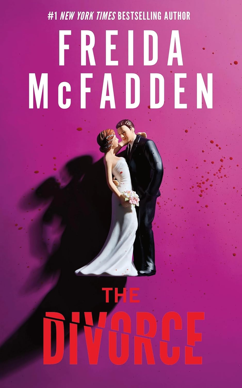 Book cover for the domestic thriller "The Divorce" by Freida McFadden. The design features a bold, high-contrast aesthetic with a stark black background. Large, modern white and vibrant yellow block letters spell out the author's name at the top and the title "The Divorce" in the center. Accompanying the text is a striking, symbolic graphic of a pristine white house shape that has been violently cracked or shattered down the center, mirroring a broken home.