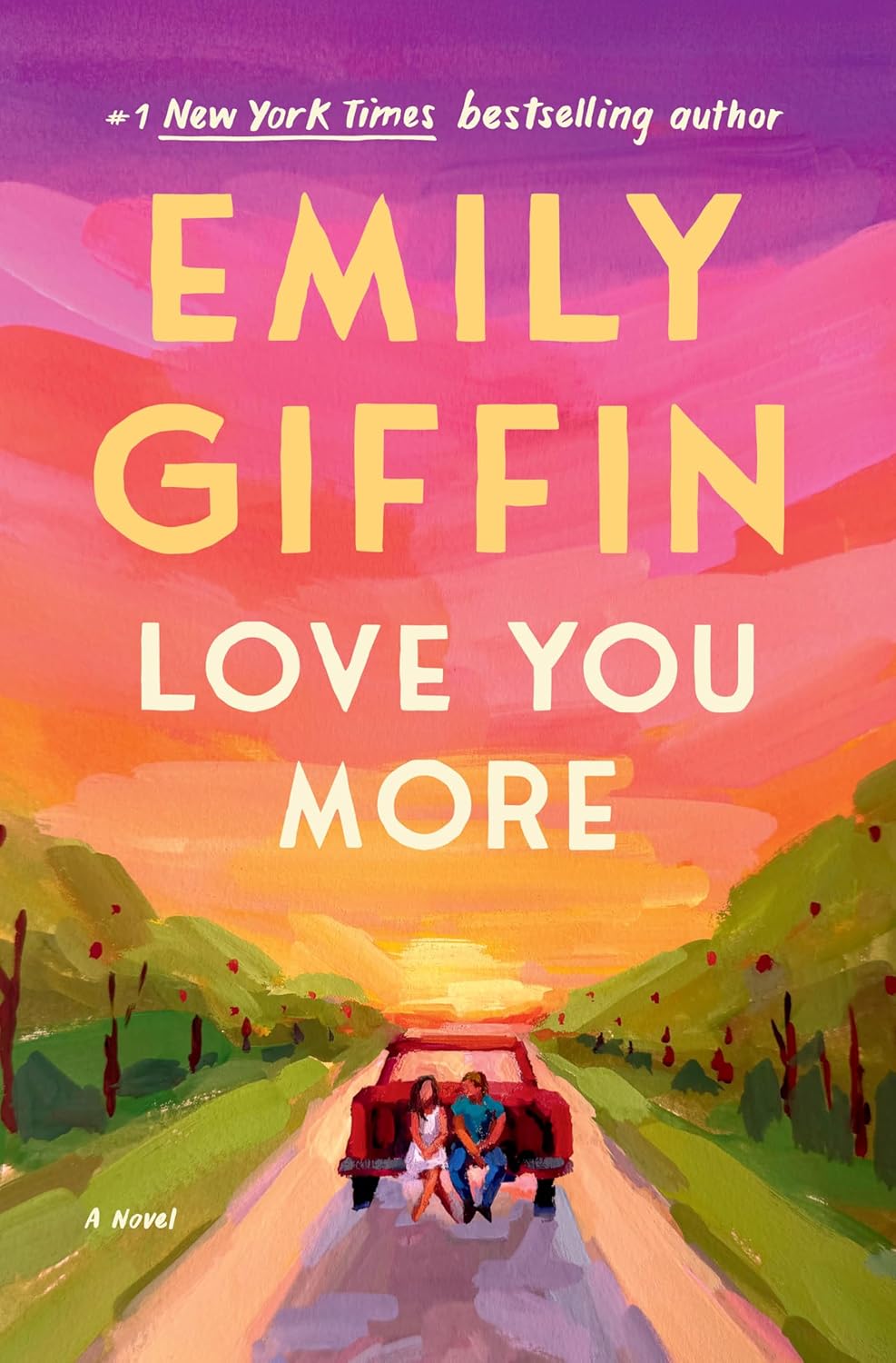 Illustrated cover of "Love You More" by Emily Giffin. A couple sits on the tailgate of a red truck on a country road at sunset, with a vivid pink-and-purple sky and green fields on either side.