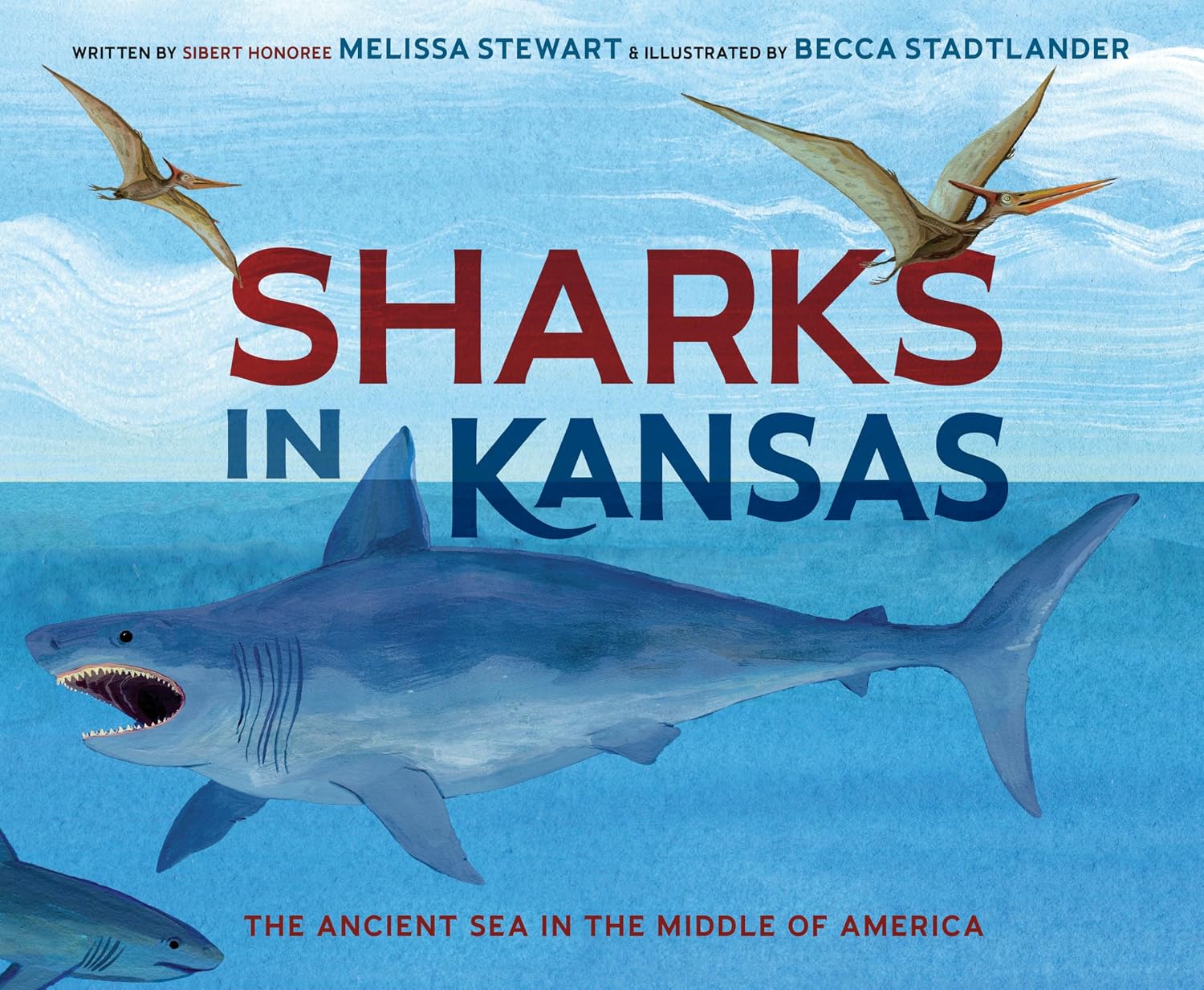 Illustrated cover of "Sharks in Kansas: The Ancient Sea in the Middle of America" by Melissa Stewart, illustrated by Becca Stadtlander. A large open-mouthed prehistoric shark swims below two flying pterosaurs in blue water.
