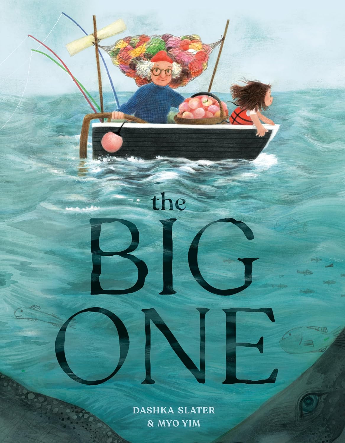 Illustrated children's book cover for "The Big One" by Dashka Slater and Myo Yim. An older person and a young girl ride in a small fishing boat piled with yarn and peaches, floating over teal water where a giant shape lurks beneath the surface.