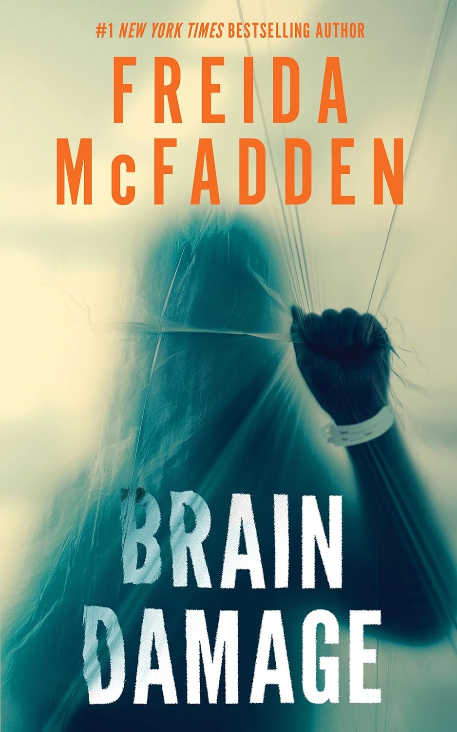 Book cover for "Brain Damage" by Freida McFadden, showing a shadowy hooded figure wrapped in plastic with a bound wrist, in teal and cream tones.